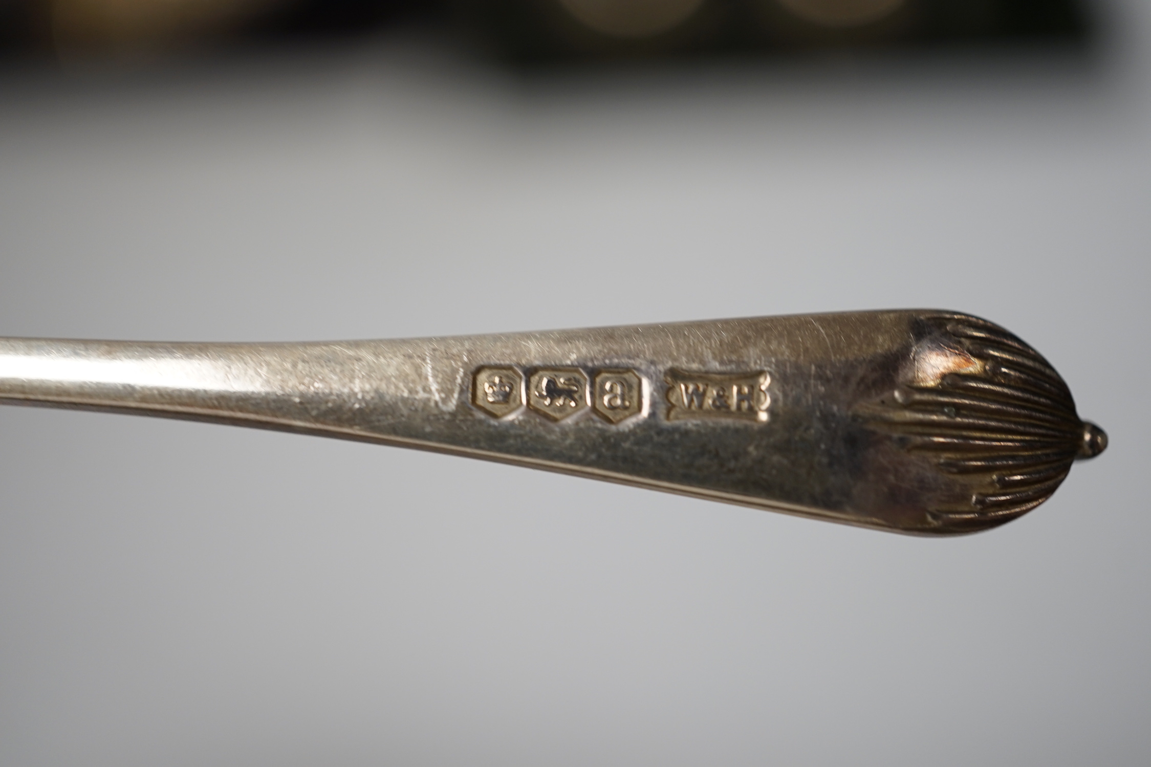 Three assorted cases of silver flatware, including two sets of six silver teaspoons and a 19th matched silver three piece serving and sifter spoon set.